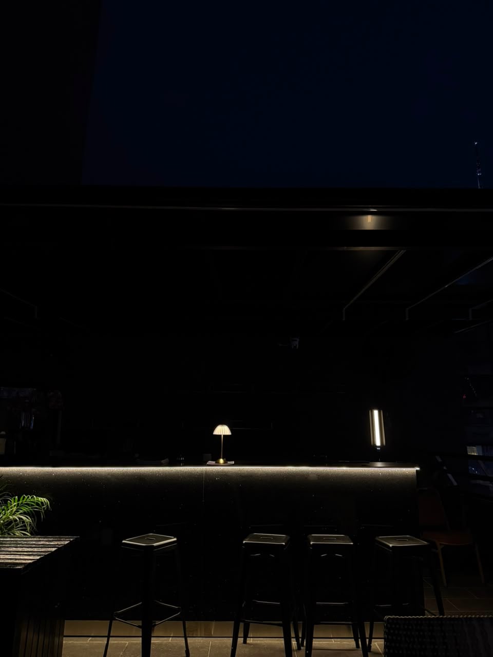 The counter, lit from beneath.