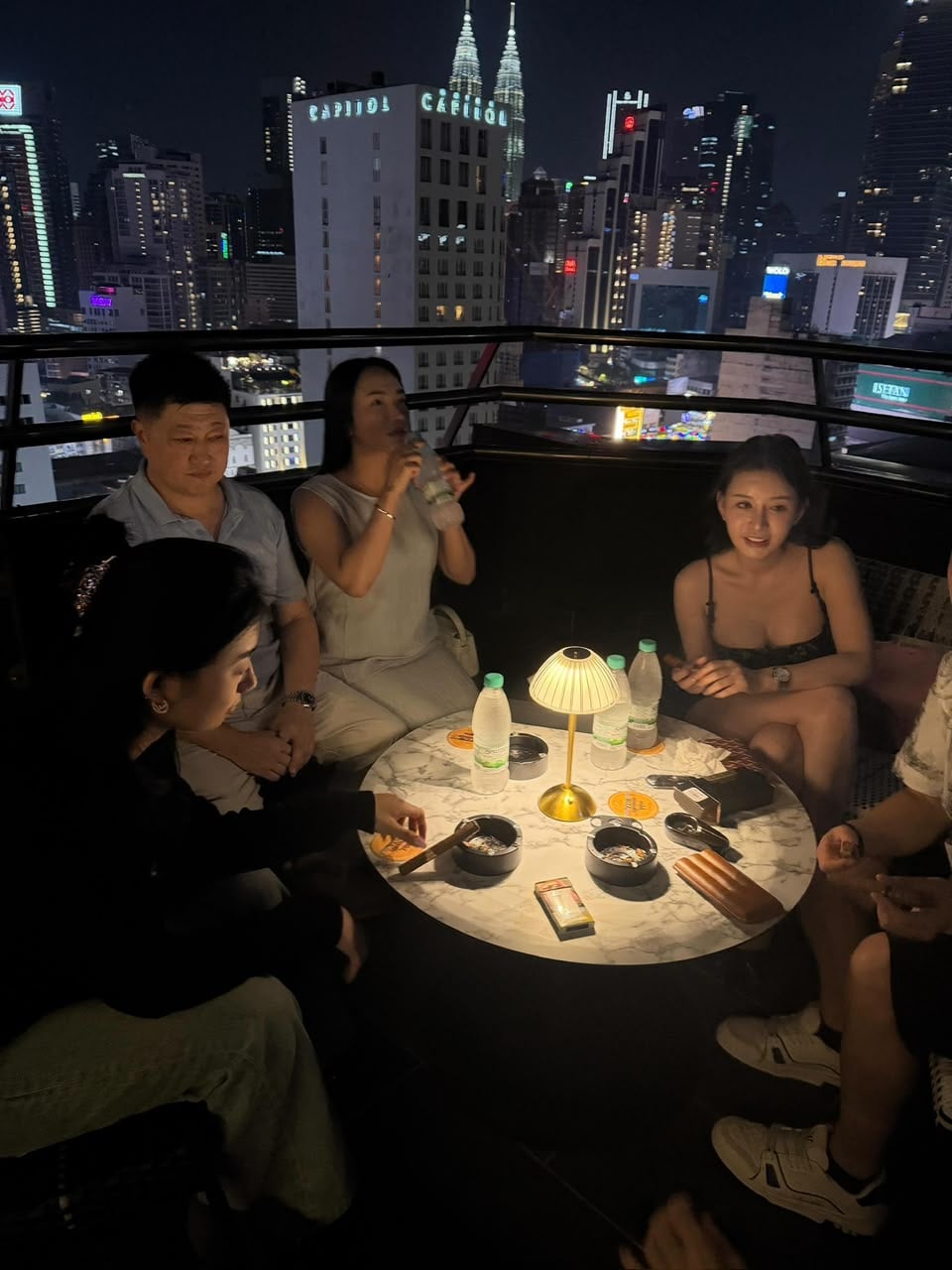 A full table under the towers.